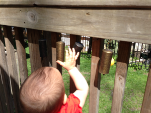 baby at fence